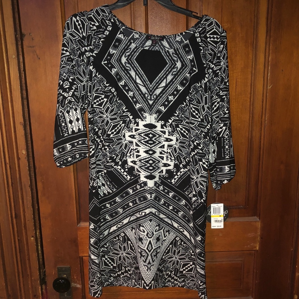 Cute black & white dress. Never worn!